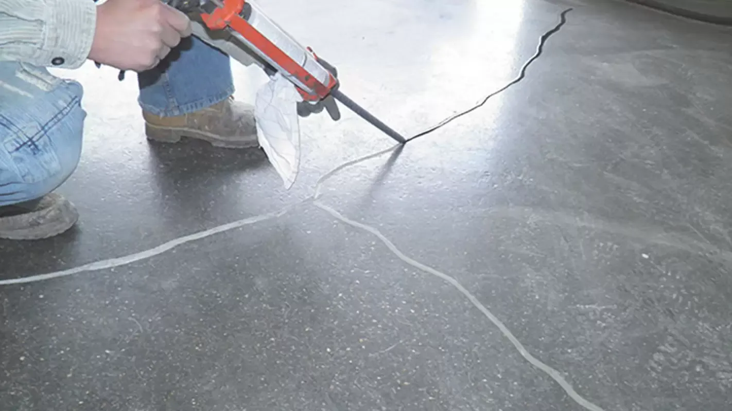 Worn concrete floor before